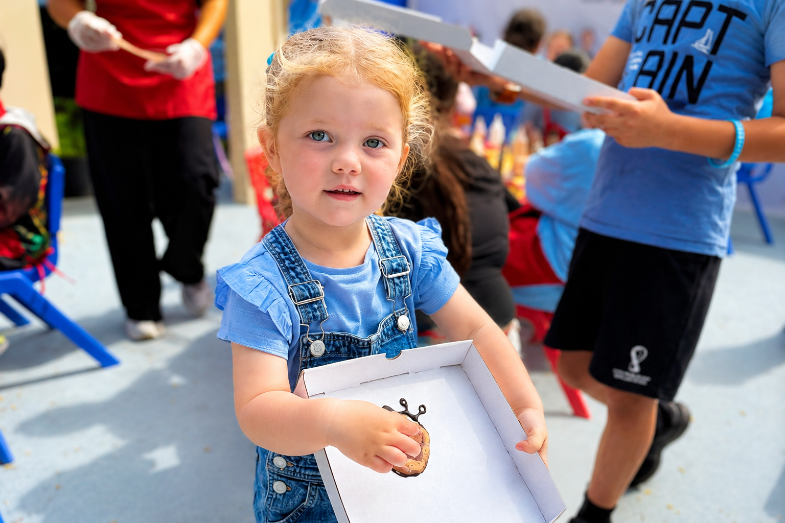 Kid smiling with plate